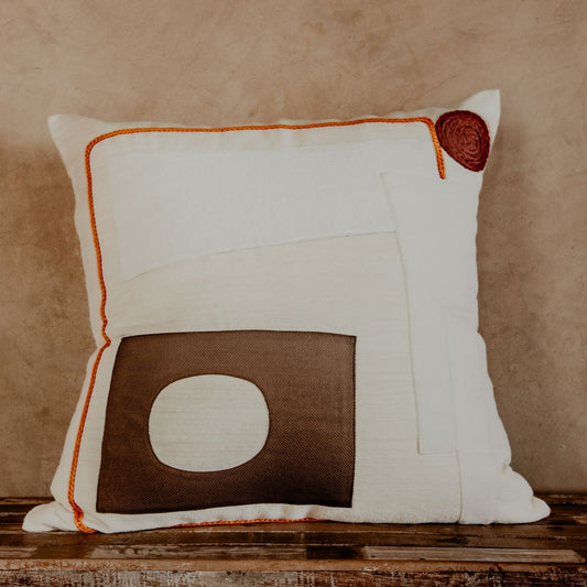 The asymmetric geometric blocks make this pillow a true boho accent piece. Hand-loomed by expert artisans, the different shapes bring an artsy look and extra coziness to your bed, sofa or chaise.