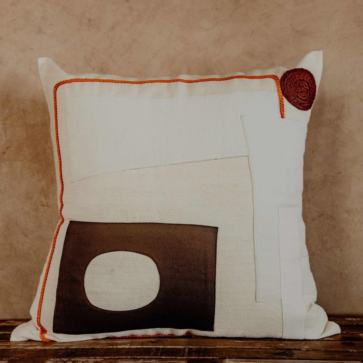 The asymmetric geometric blocks make this pillow a true boho accent piece. Hand-loomed by expert artisans, the different shapes bring an artsy look and extra coziness to your bed, sofa or chaise.