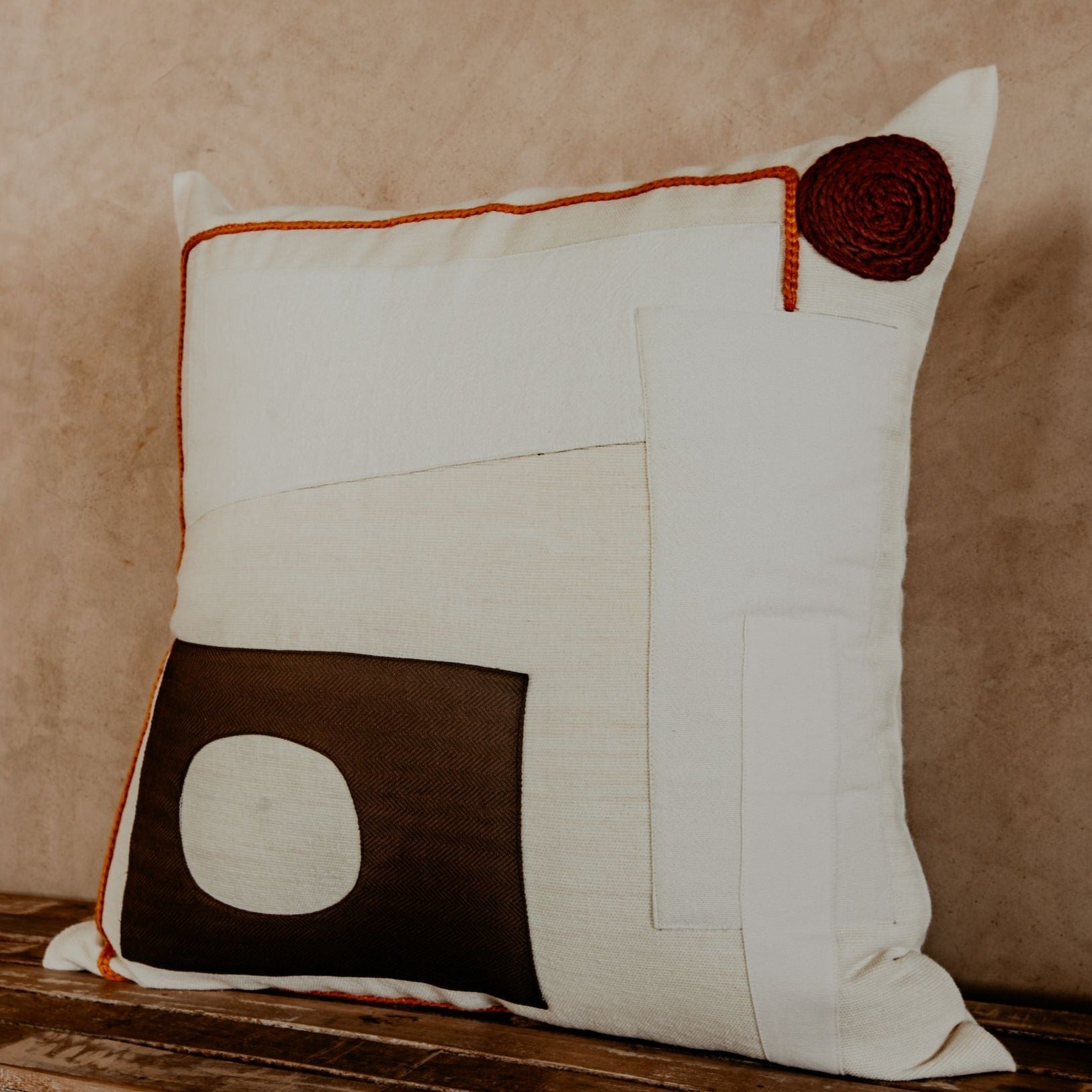 The asymmetric geometric blocks make this pillow a true boho accent piece. Hand-loomed by expert artisans, the different shapes bring an artsy look and extra coziness to your bed, sofa or chaise.