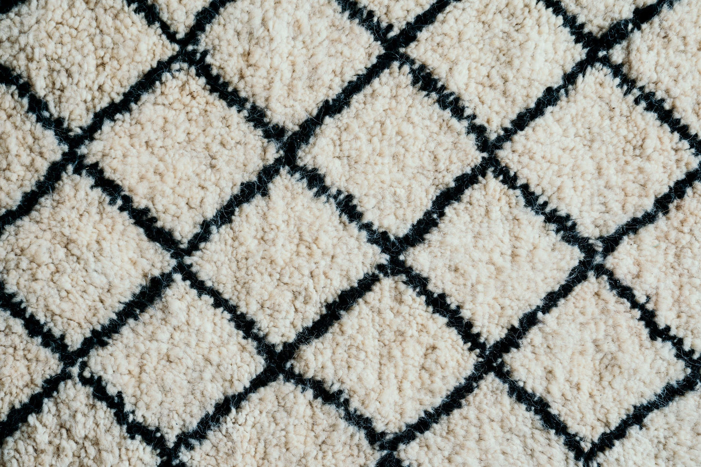 Beni Ourain Tribal Rug, knot weaved featuring Diamond pattern in black and white handmade in Morocco using organic sheep wool