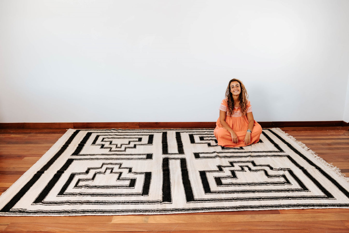 Moroccan kilim rug, handmade in Morocco, flat weaved, white base with black abstract geometric designs, made using organic sheep wool from the atlas mountains