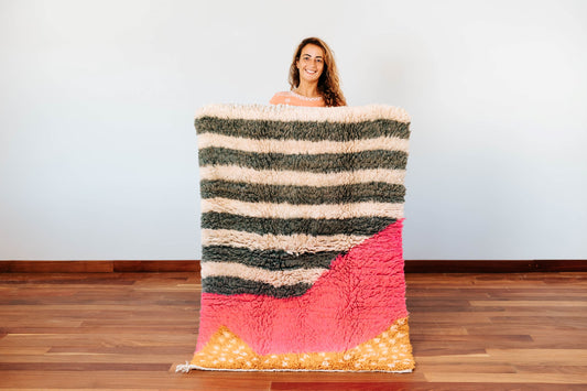 Fluffy rug, handmade in Morocco, knot weaved featuring witty design and playful vibrant colours, soft and fluffy texture.