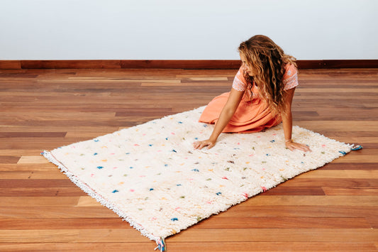 Beni ourain tribal rug, Handmade in Morocco, knot weaved featuring ivory-coloured natural wool base, adorned with funky multi-colored polka dots. 